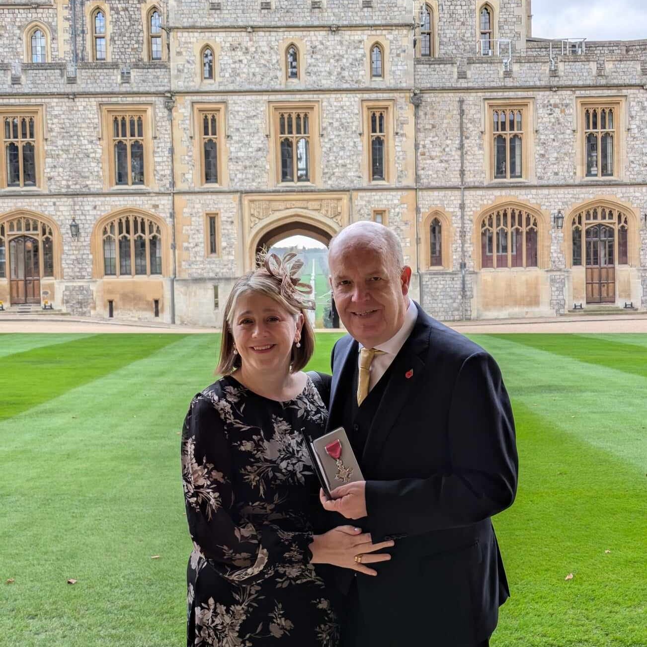 Phil with his wife Maria after being presented with the MBE at Windsor Castle, by His Royal Highness William, Prince of Wales in November