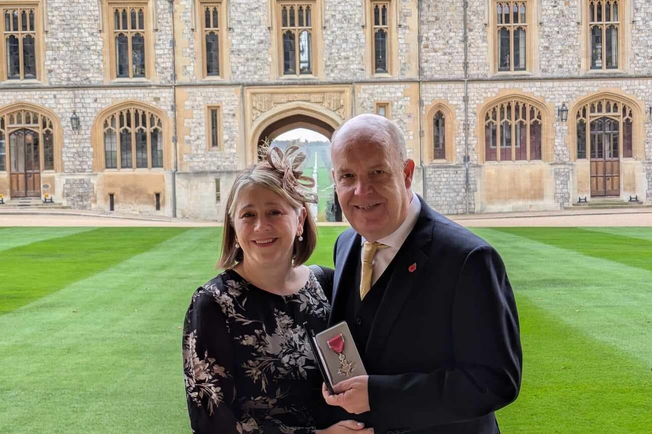 Phil with his wife Maria after being presented with the MBE at Windsor Castle, by His Royal Highness William, Prince of Wales in November