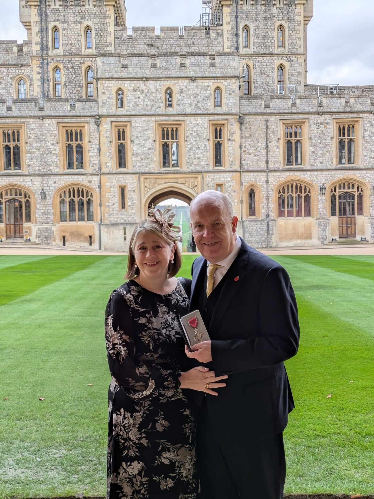 Phil with his wife Maria after being presented with the MBE at Windsor Castle, by His Royal Highness William, Prince of Wales in November